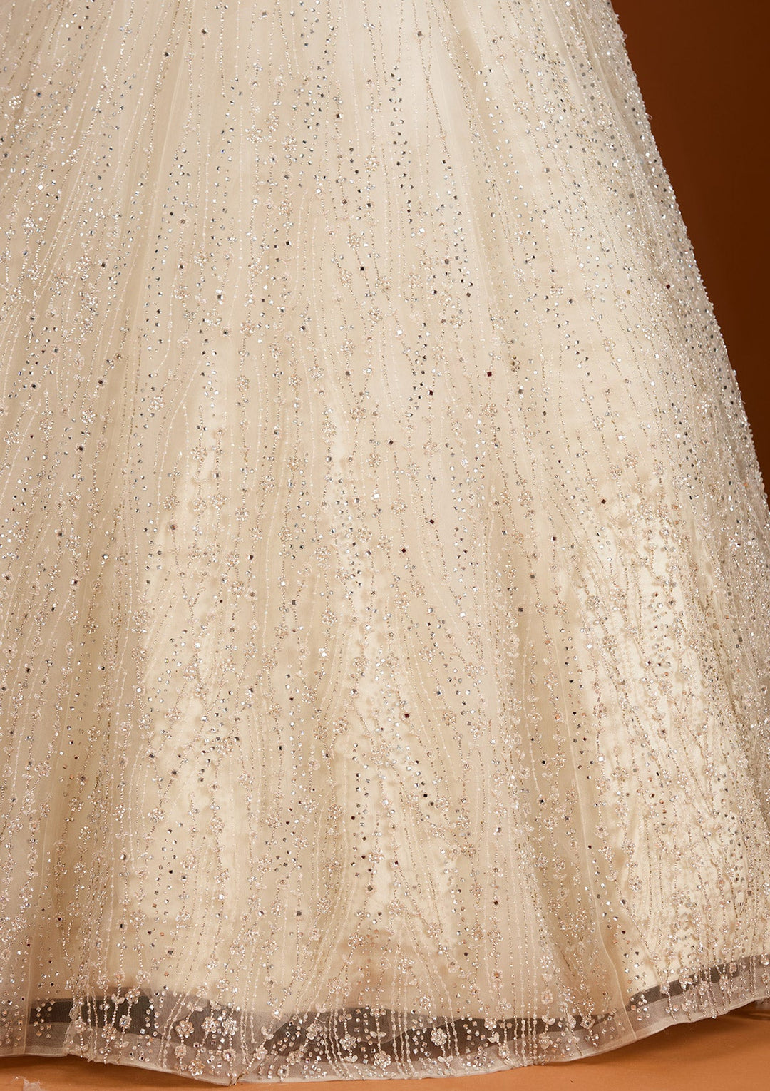 Cream Silver Stonework Net Readymade Lehenga-koskii