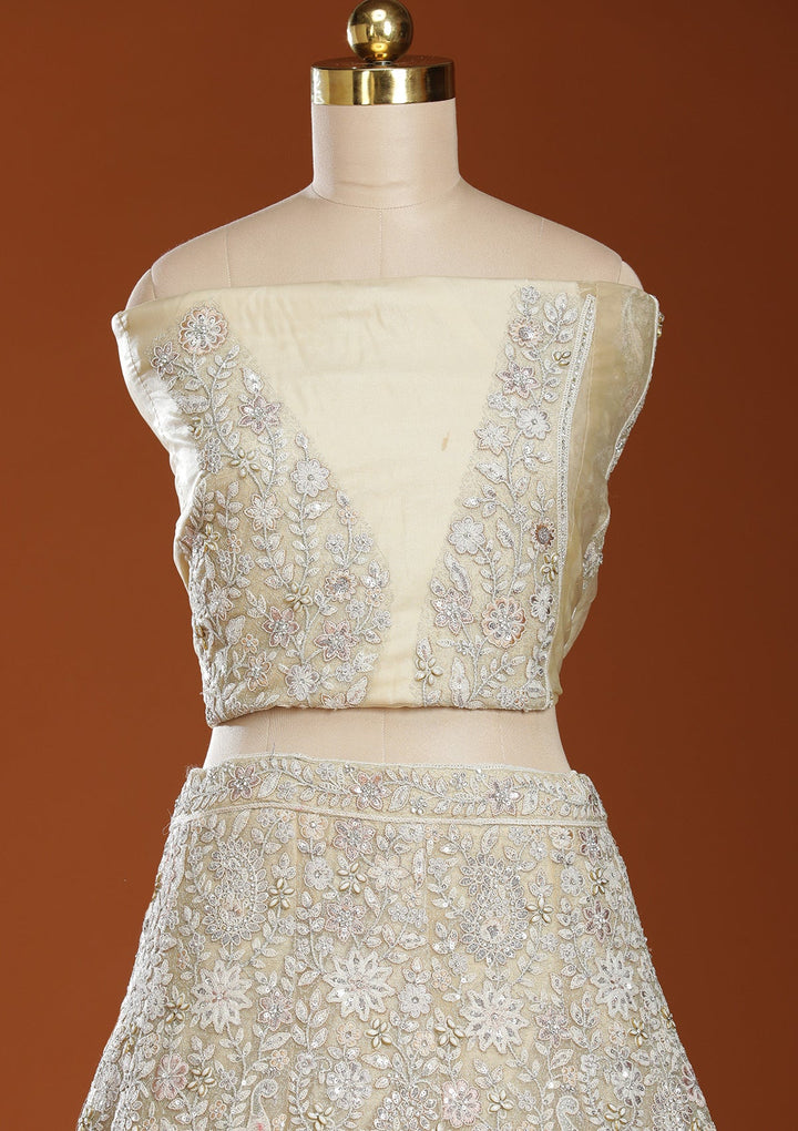 Off White Threadwork Net Semi-Stitched Lehenga
