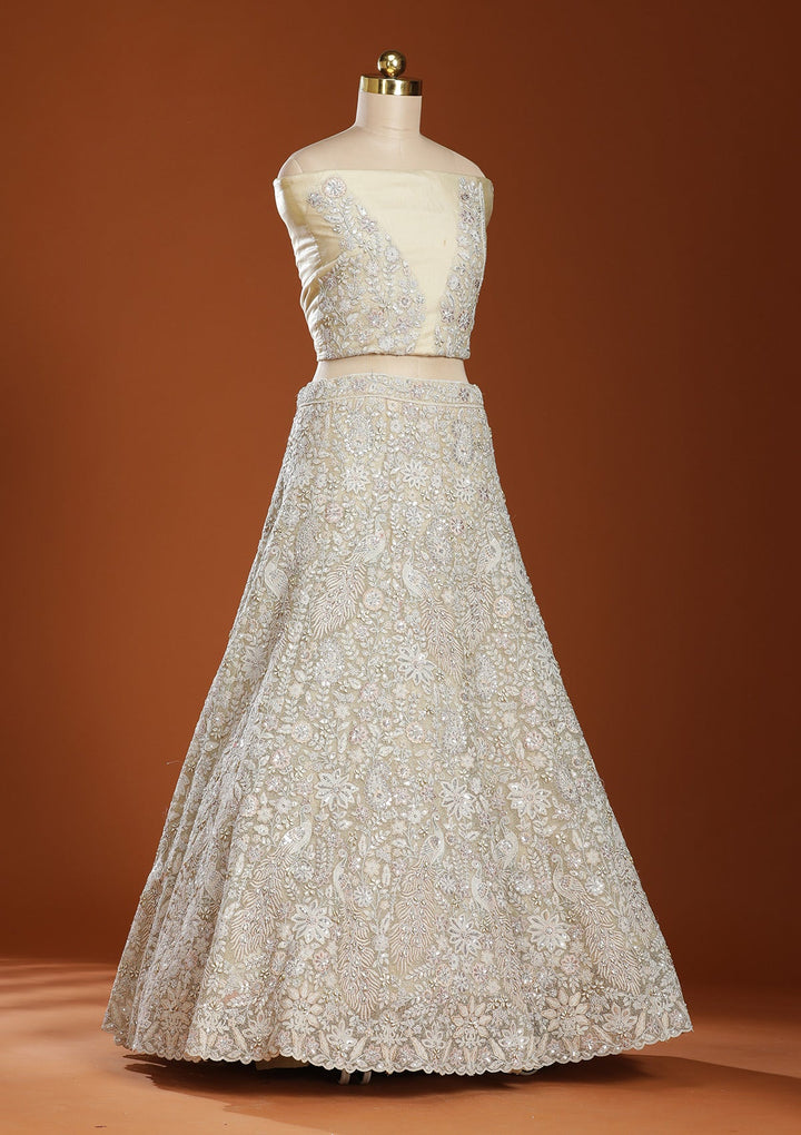 Off White Threadwork Net Semi-Stitched Lehenga
