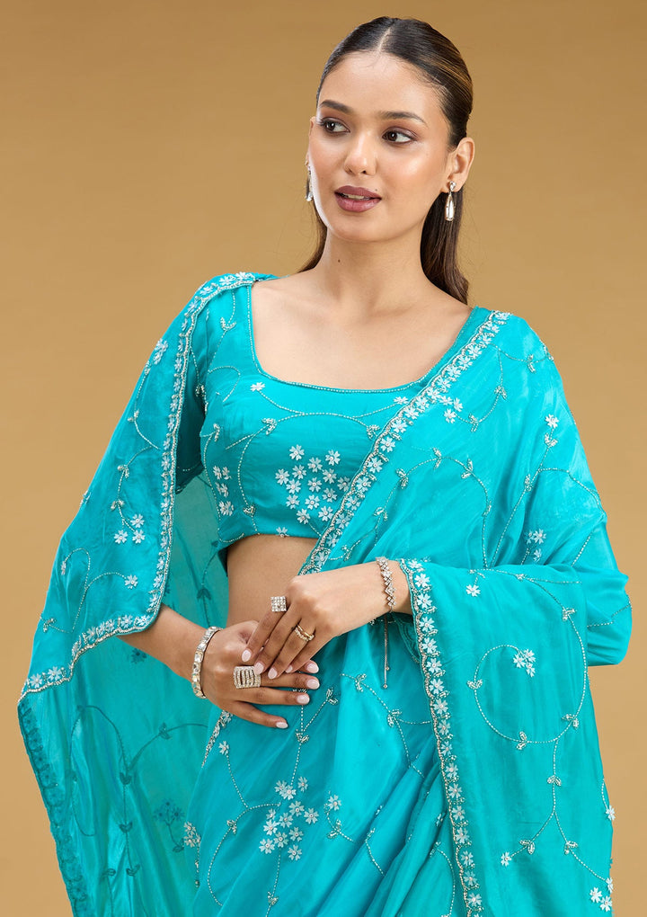 Turquoise Blue Aariwork Satin Saree