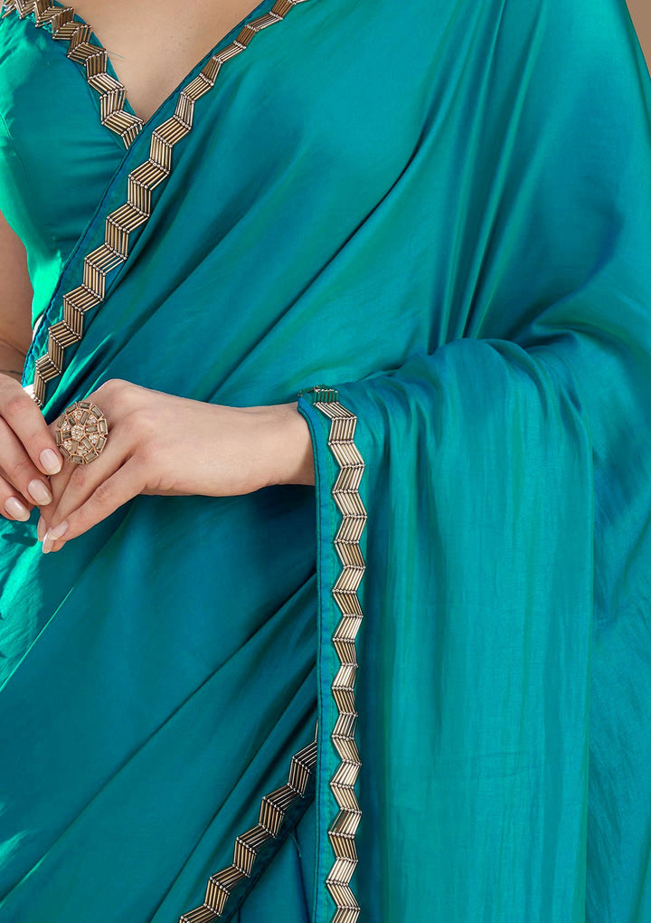 Turquoise Blue Aariwork Satin Saree