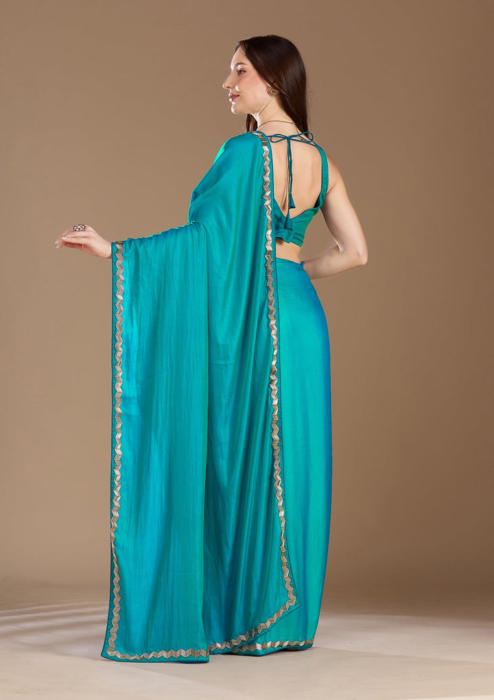 Turquoise Blue Aariwork Satin Saree