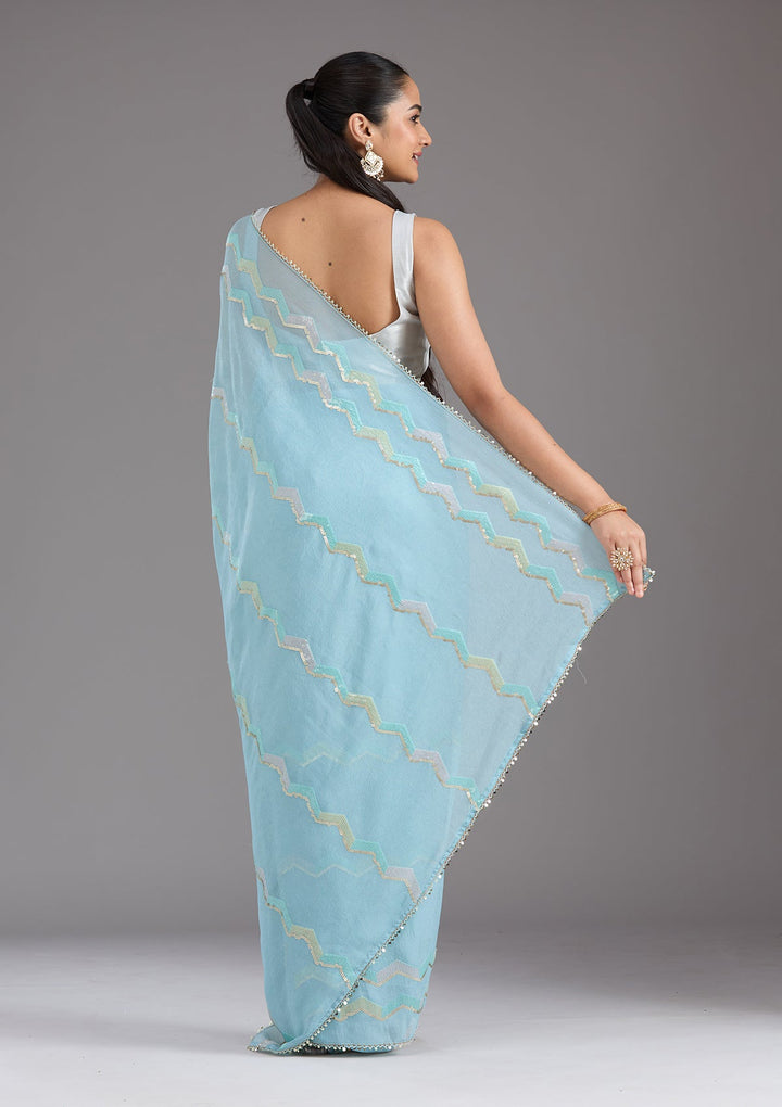 Sky Blue Sequins Semi Crepe Saree_koskii