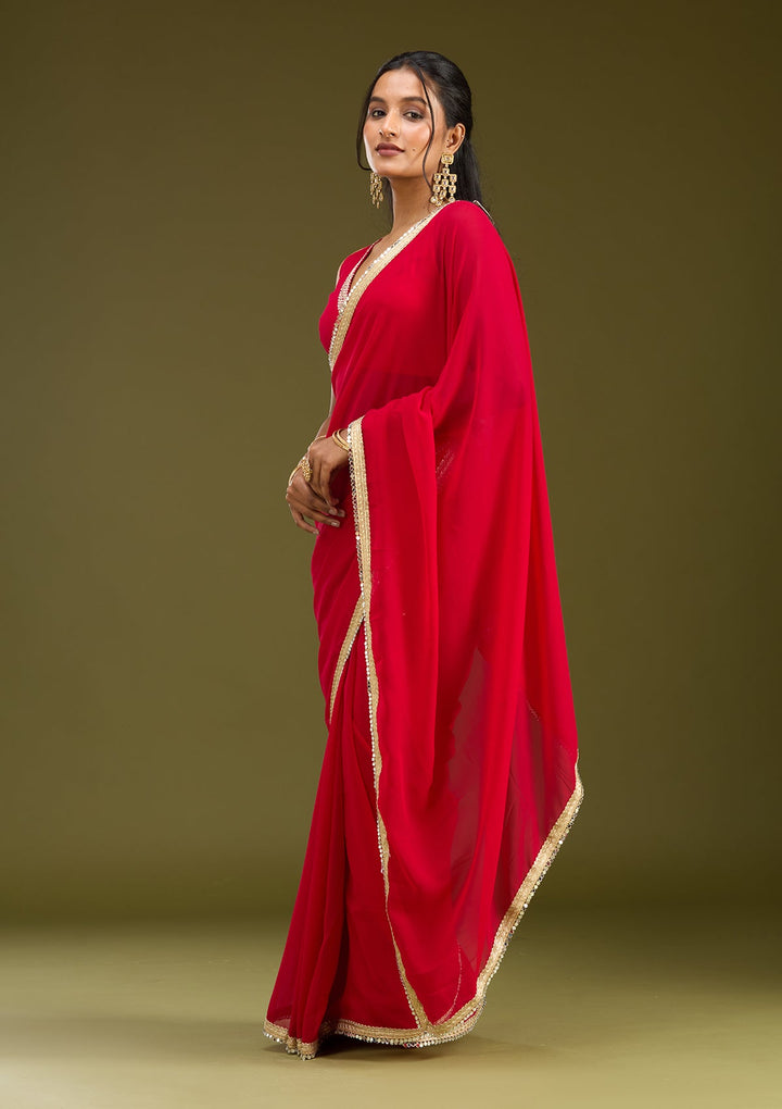 Rani Pink Cutwork Tissue Saree