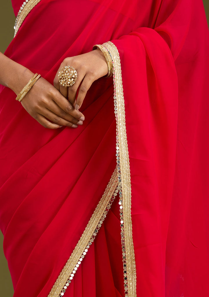 Rani Pink Cutwork Tissue Saree