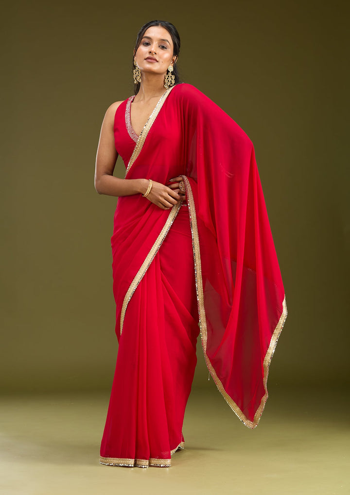 Rani Pink Cutwork Tissue Saree