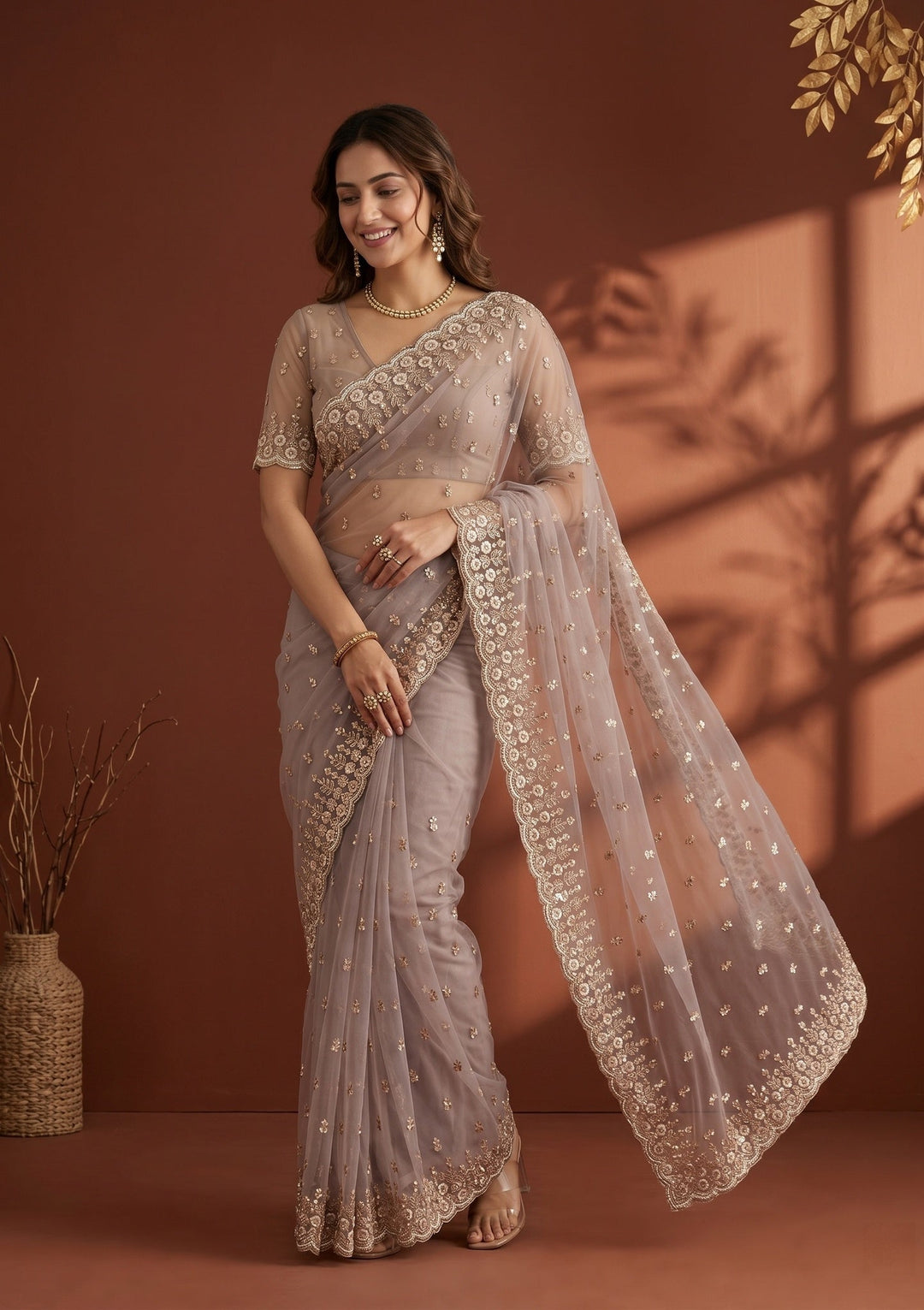 Mauve Net Sequins Saree With Matching Blouse Piece