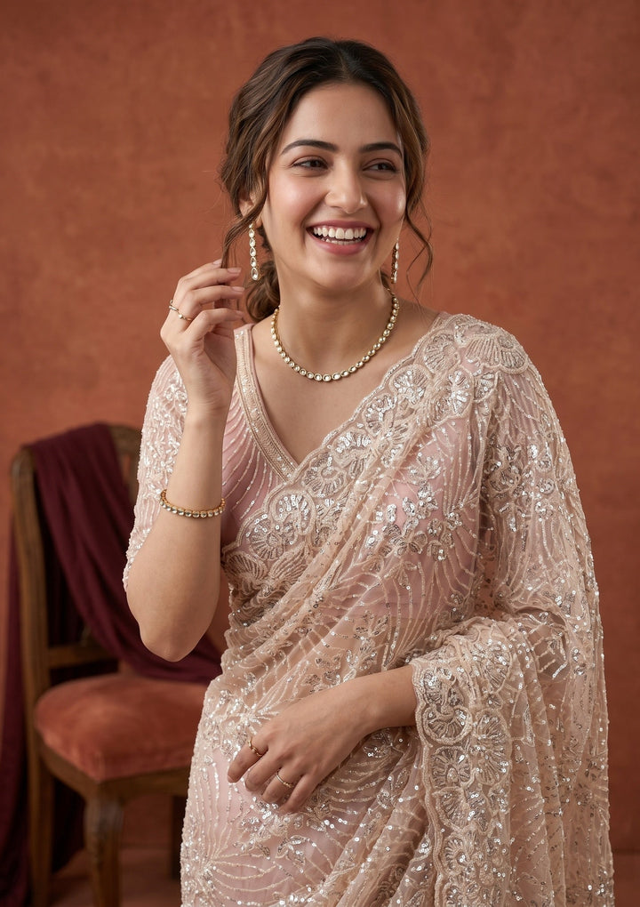 Baby Pink Net Sequins Saree With Matching Blouse Piece