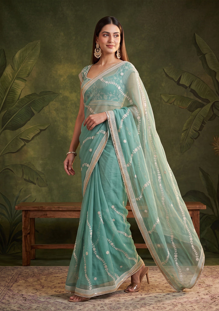 Sea Green Threadwork Georgette Saree With Matching Blouse Piece