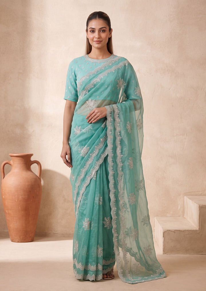 Sea Green Georgette Threadwork Saree With Matching Blouse Piece