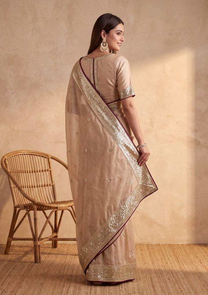 Beige Crepe Sequins Saree With Matching Blouse Piece