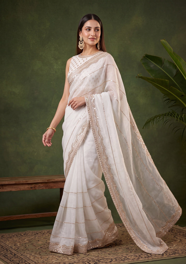 Off White Tissue Gold Zariwork Saree With Matching Blouse Piece
