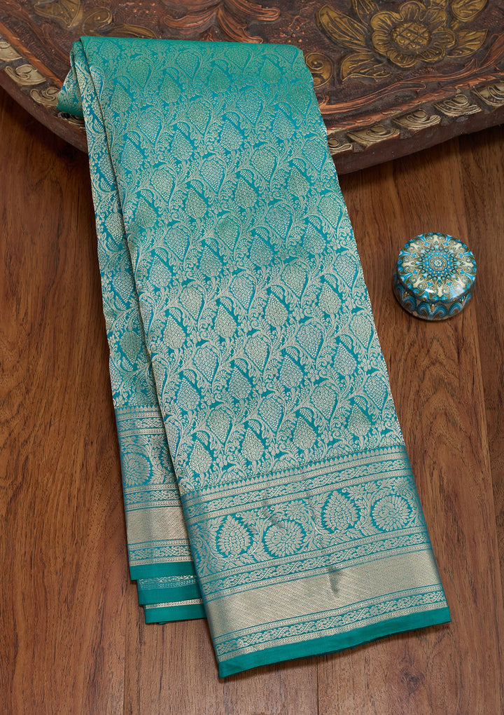 Peacock Green Silk Jaal Saree With Matching Blouse Piece