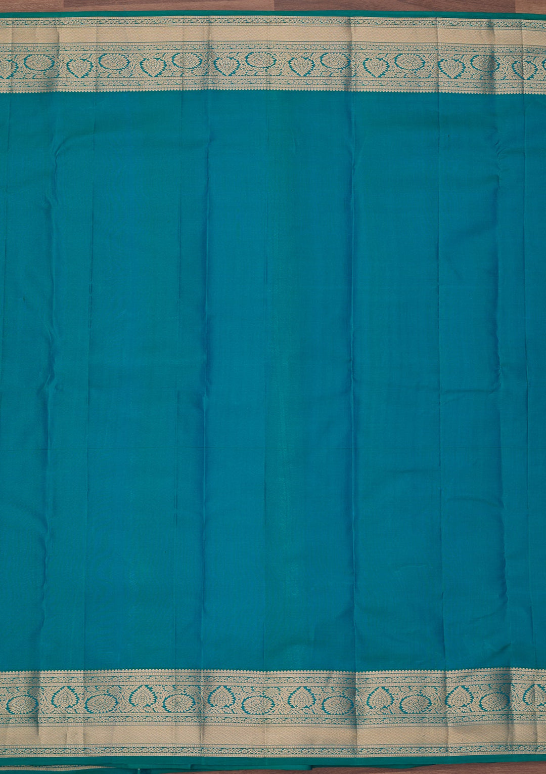 Peacock Green Silk Jaal Saree With Matching Blouse Piece