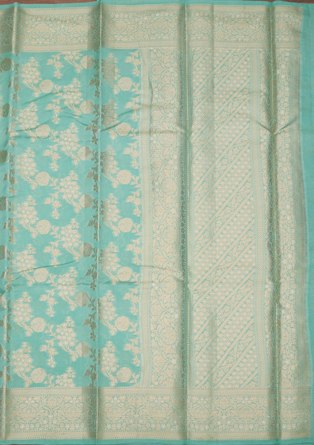Sea Green Silk Jaal Saree With Matching Blouse Piece