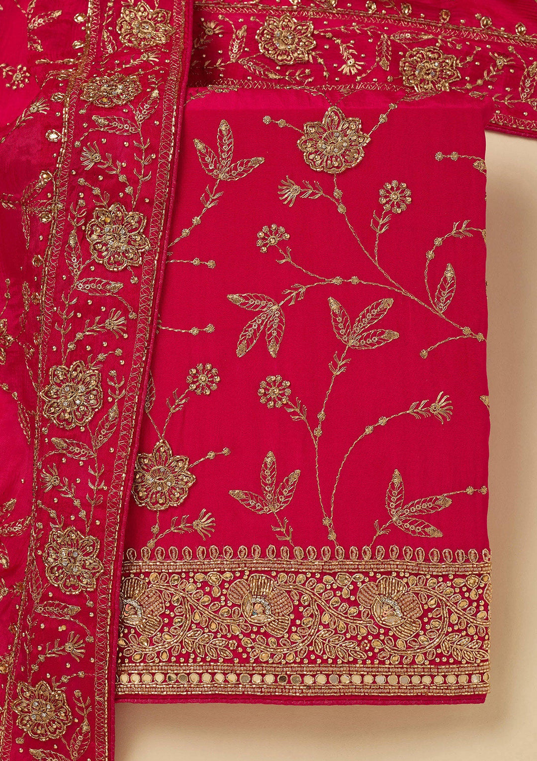 Rani Pink Zariwork (Gold) Semi Crepe Unstitched Salwar Suit_koskii