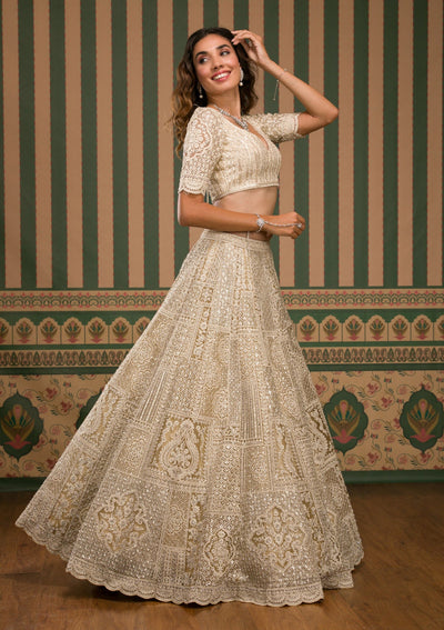 Beige Threadwork Net Semi Stitched Lehenga