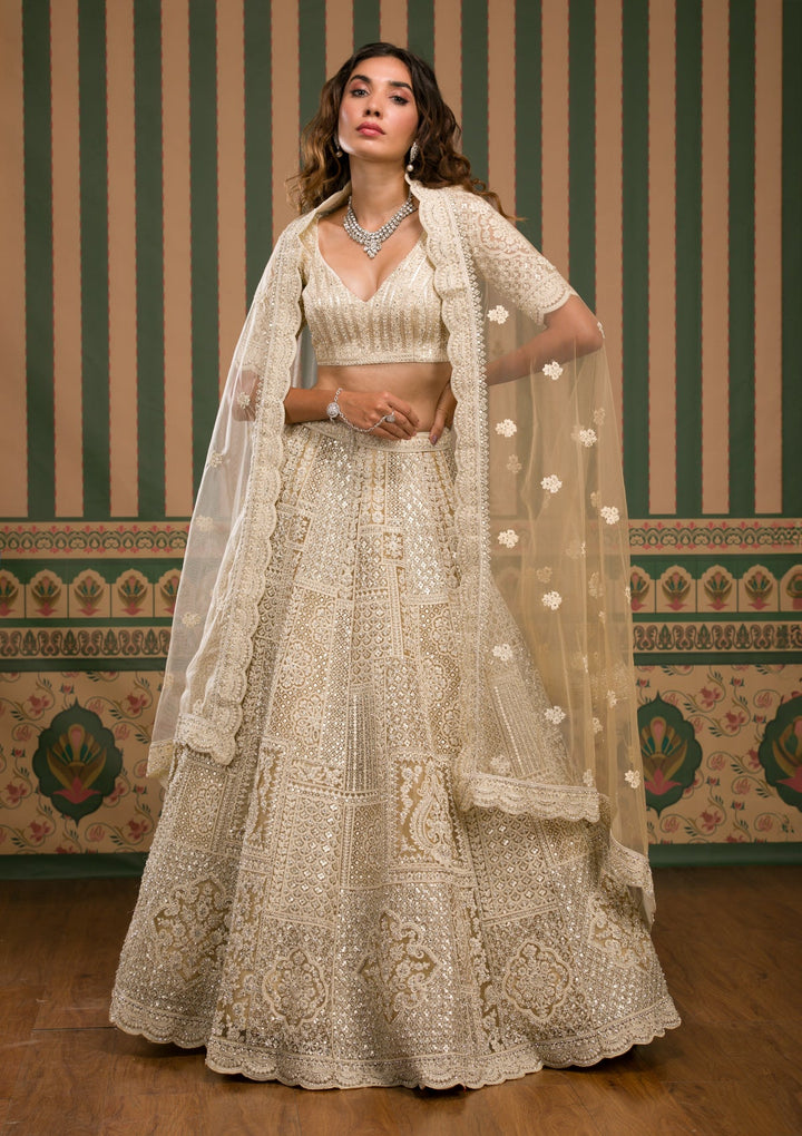Beige Threadwork Net Semi Stitched Lehenga