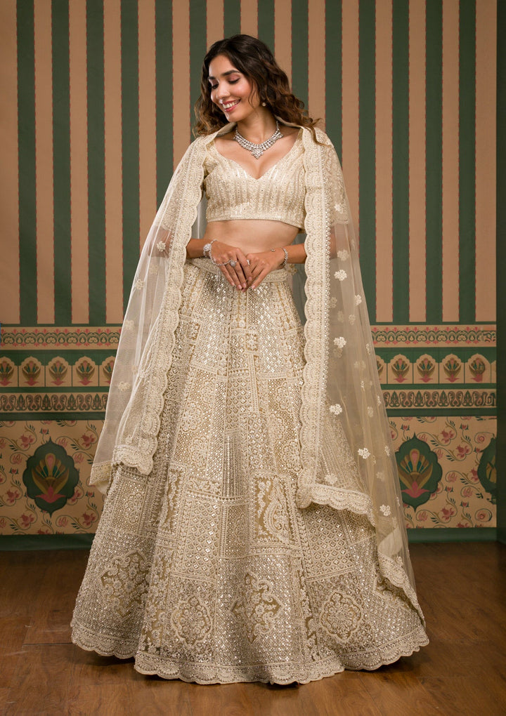 Beige Threadwork Net Semi Stitched Lehenga