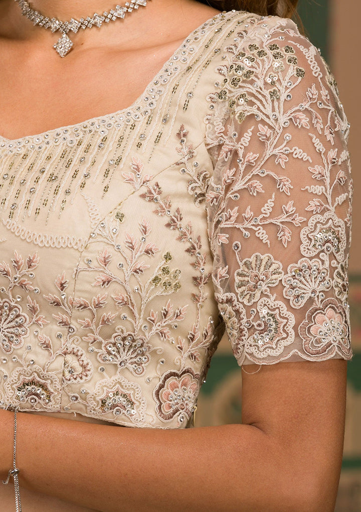 Cream Sequins Net Semi Stitched Lehenga