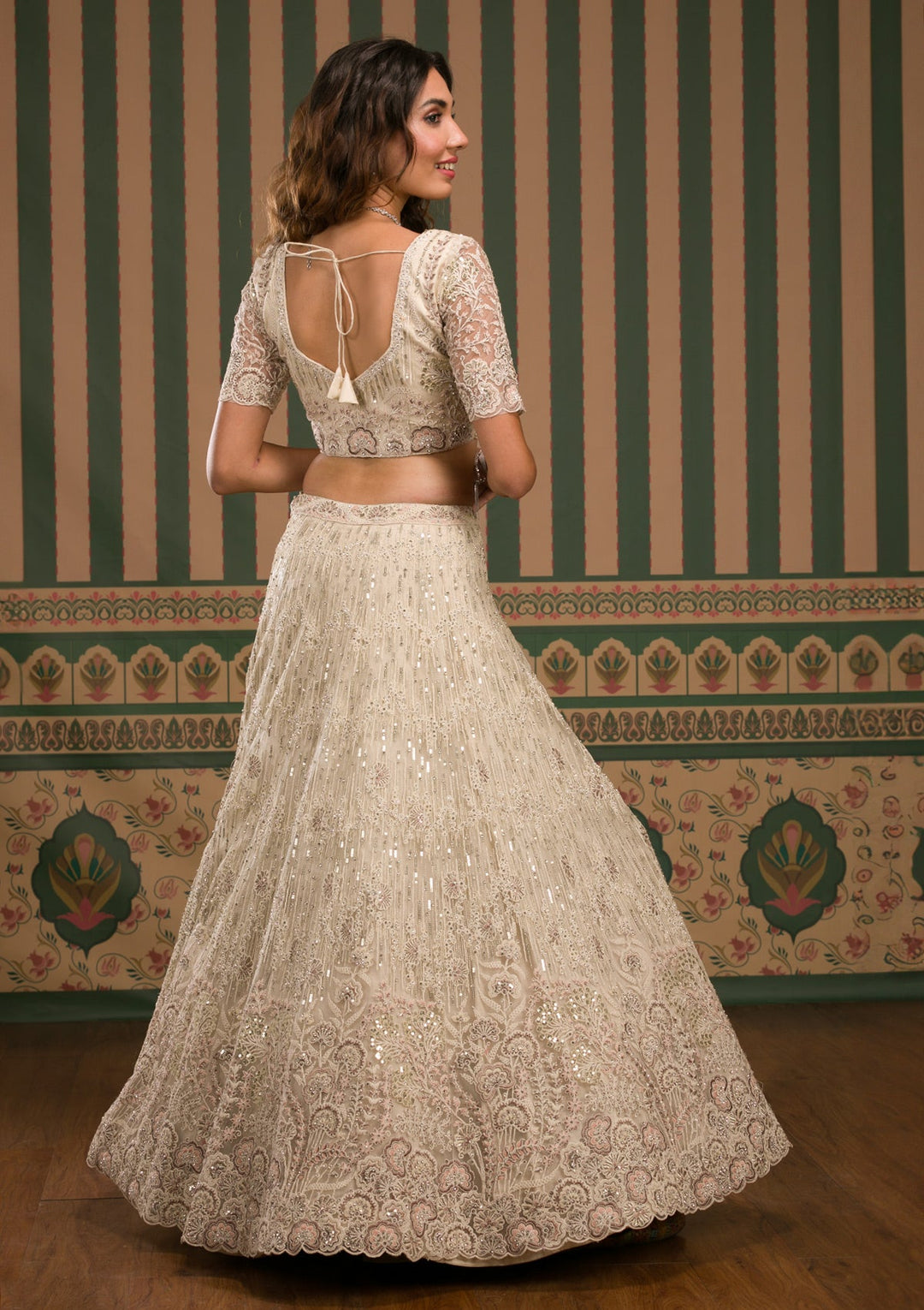 Cream Sequins Net Semi Stitched Lehenga