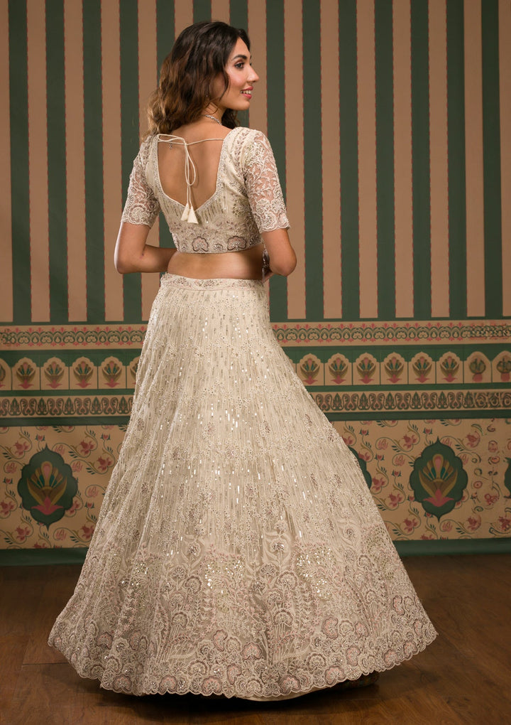 Cream Sequins Net Semi Stitched Lehenga