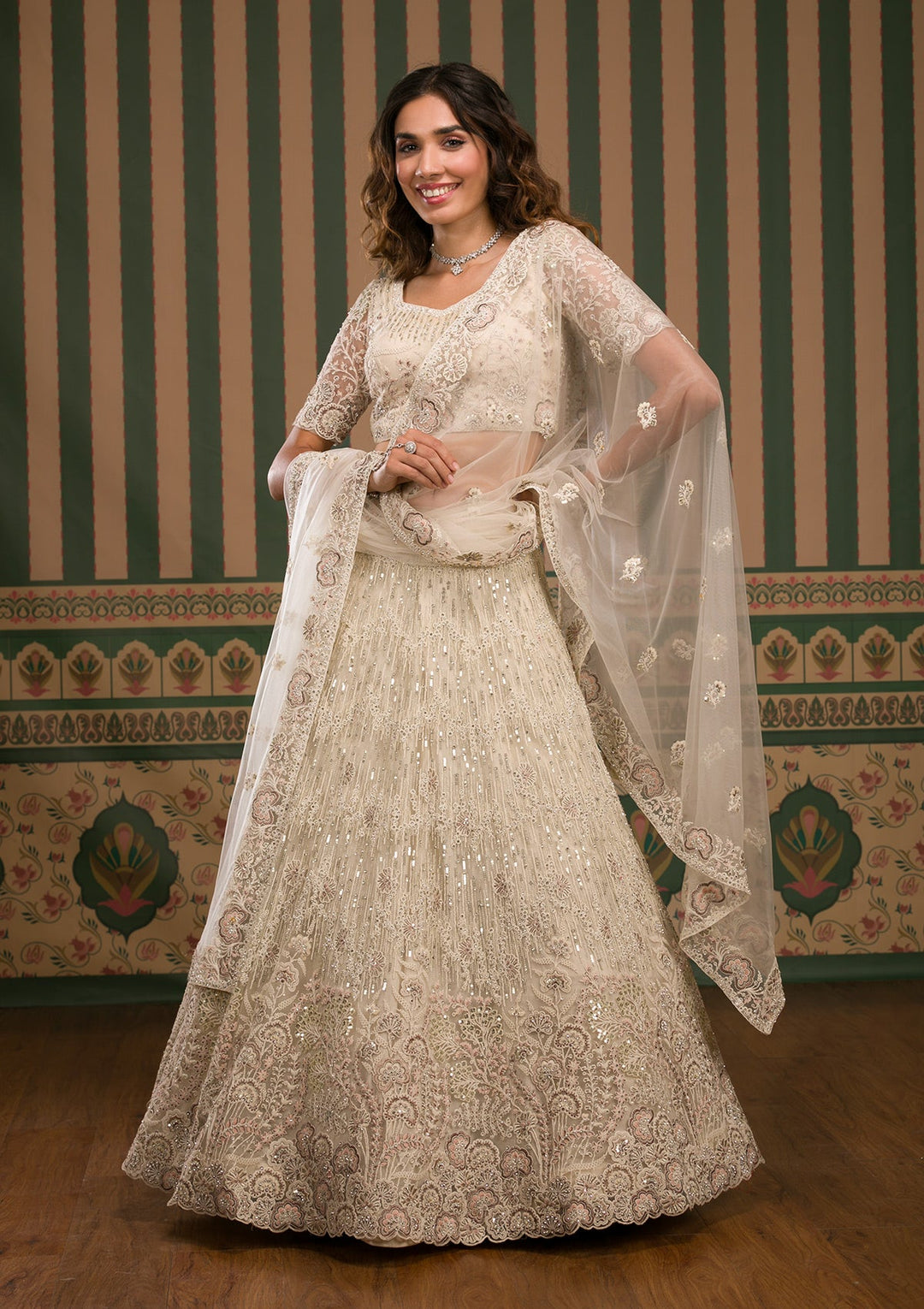 Cream Sequins Net Semi Stitched Lehenga