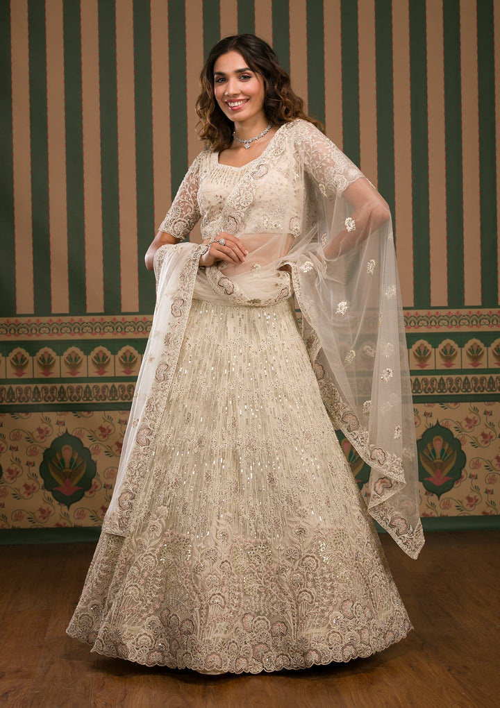 Cream Sequins Net Semi Stitched Lehenga