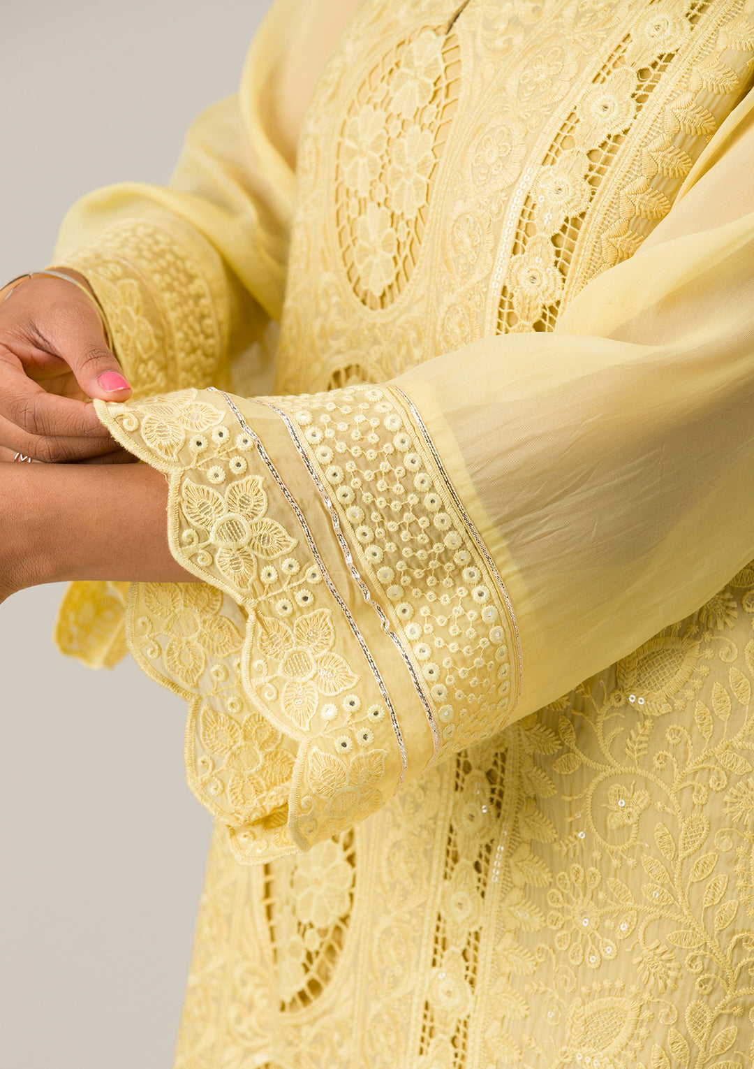 Lemon Yellow Cutwork Georgette Unstitched Salwar Suit Lemon Yellow Cutwork Georgette Unstitched Salwar Suit
