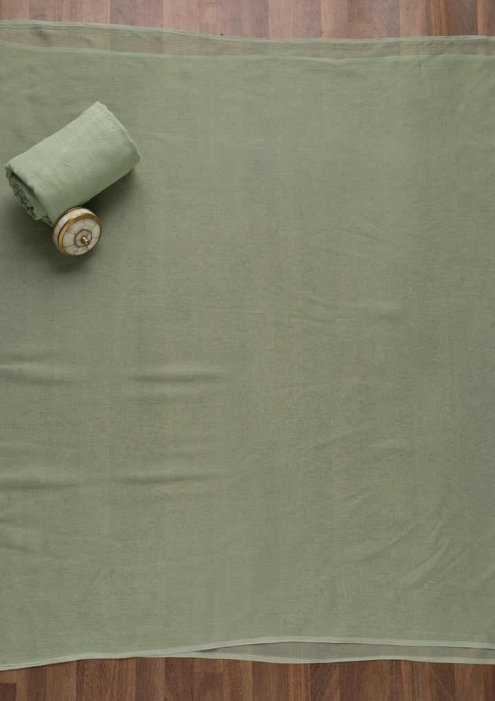 Light Green Swarovski Semi Crepe Unstitched Salwar Suit-Koskii