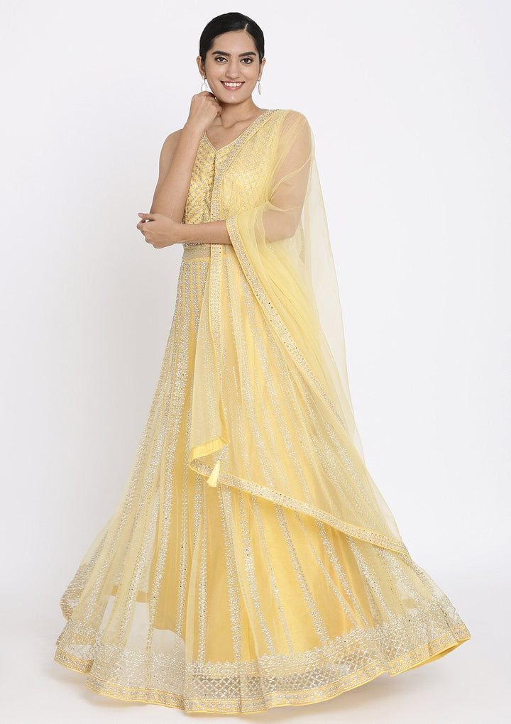 Yellow Silver Stonework Net Designer Gown - koskii