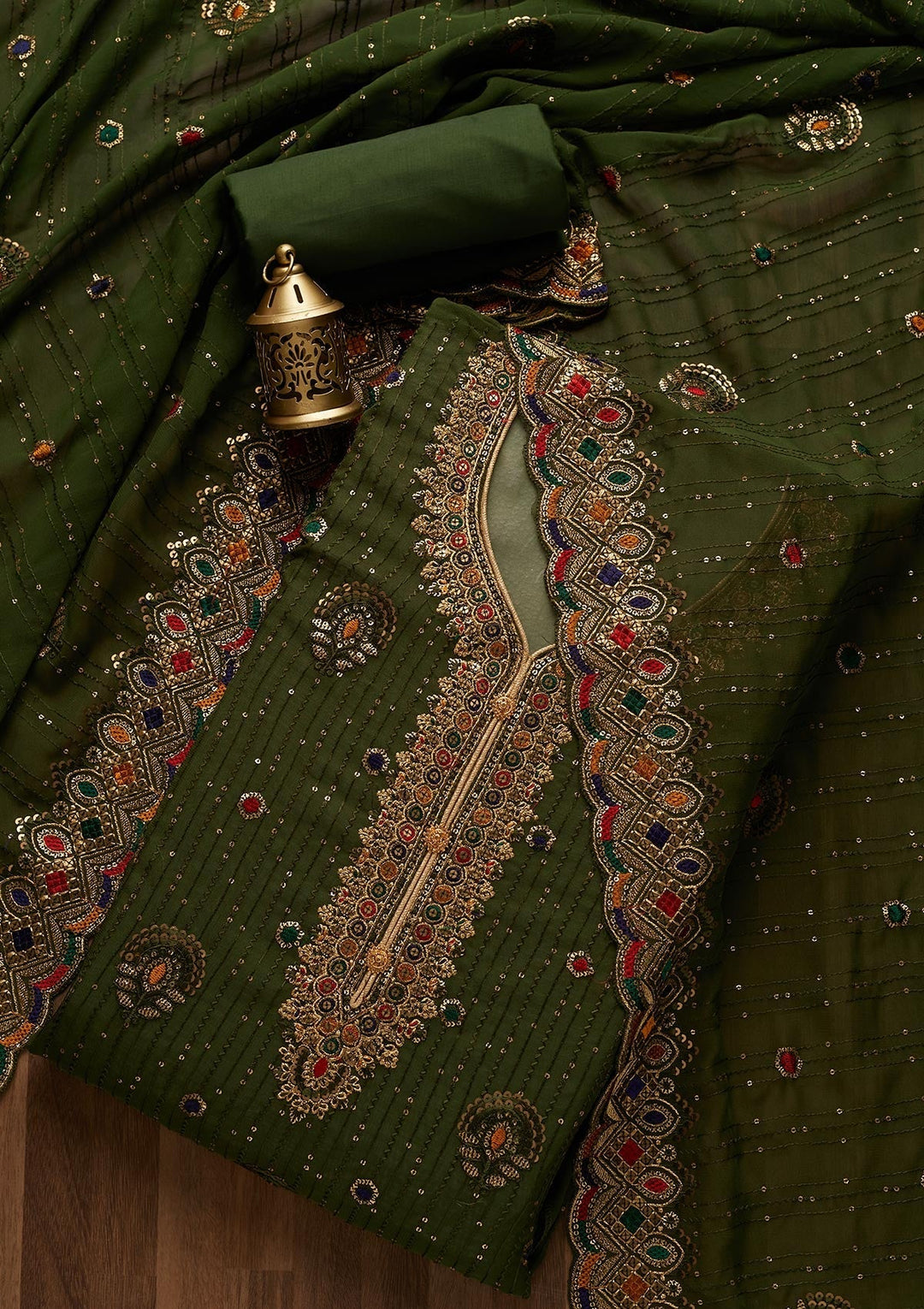Bottle Green Sequins Semi Crepe Semi-Stitched Salwar Suit- Koskii