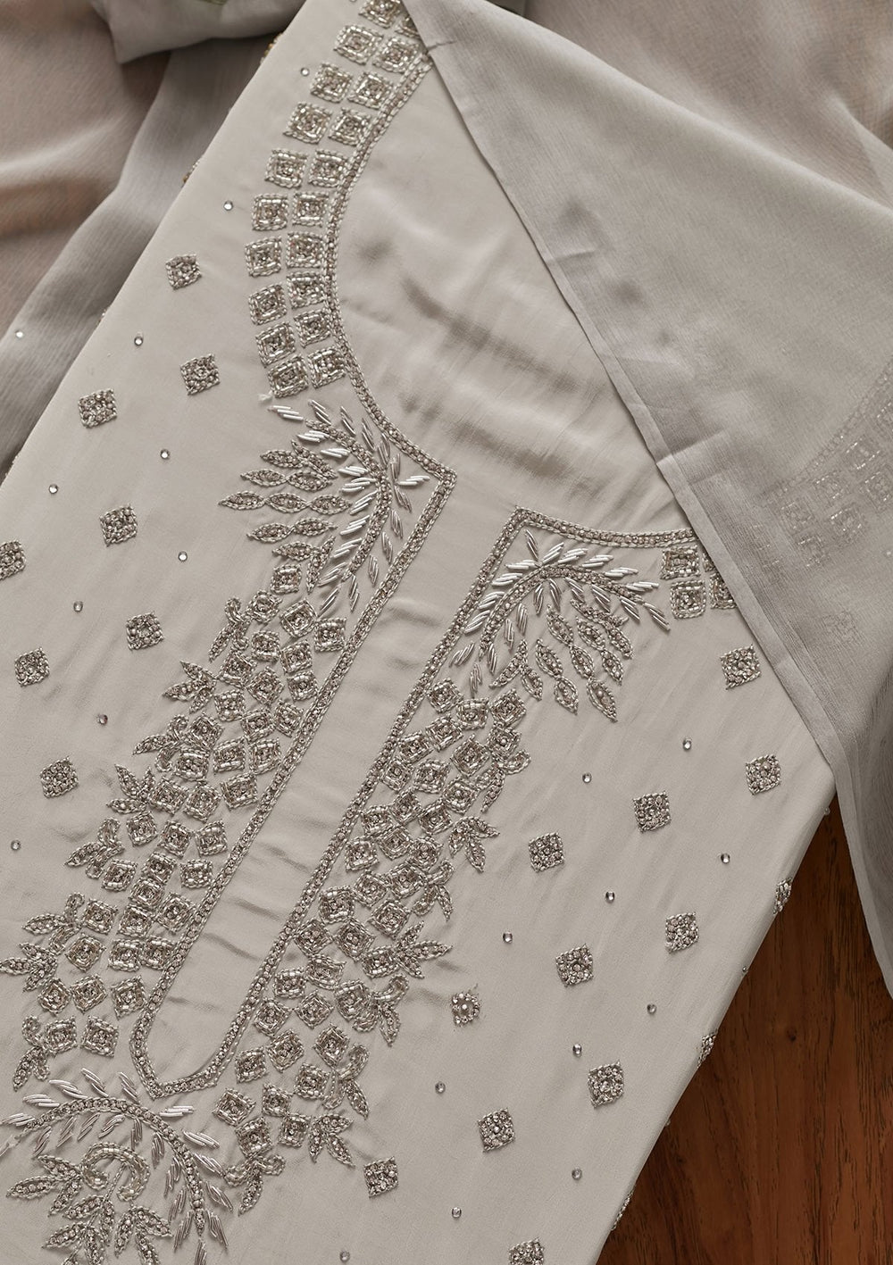 Light Grey Cutdana Semi Crepe Designer Unstitched Salwar Suit - koskii