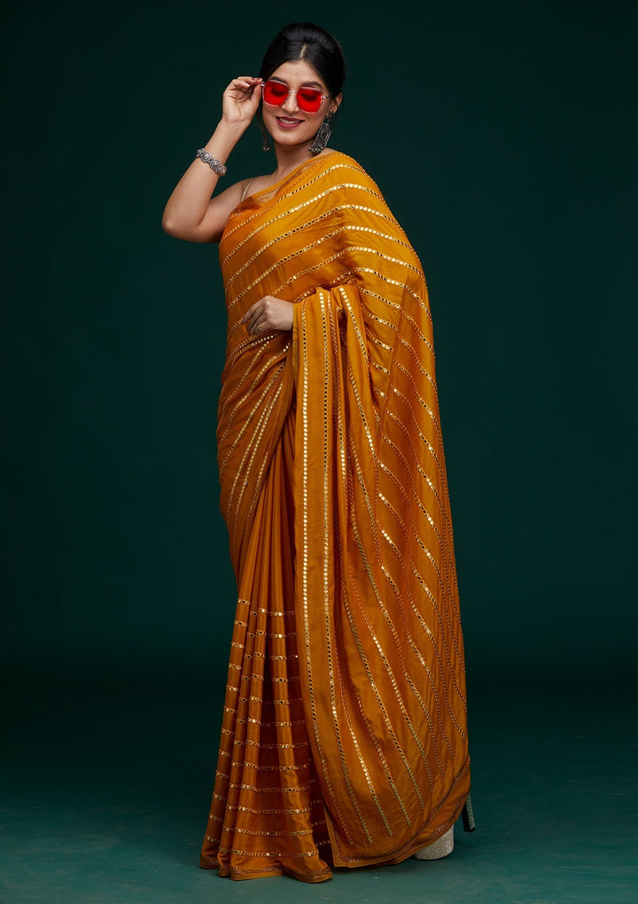 Mustard Swarovski Georgette Saree - Koskii