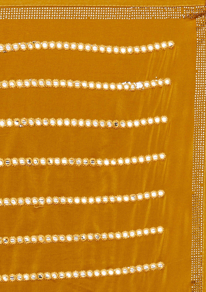 Mustard Swarovski Georgette Saree - Koskii