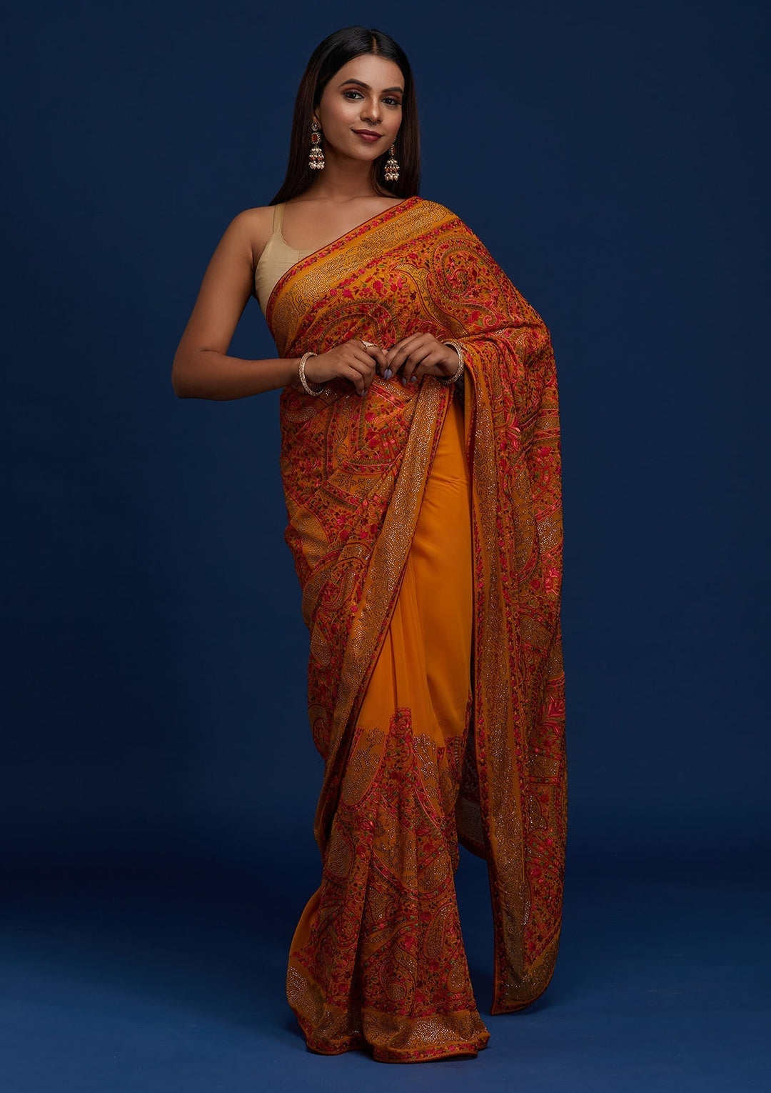 Mustard Swarovski Georgette Designer Saree - Koskii