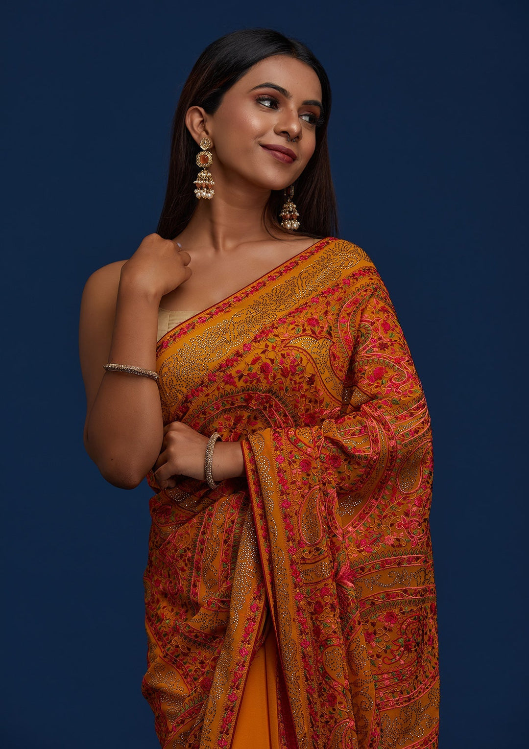 Mustard Swarovski Georgette Designer Saree - Koskii