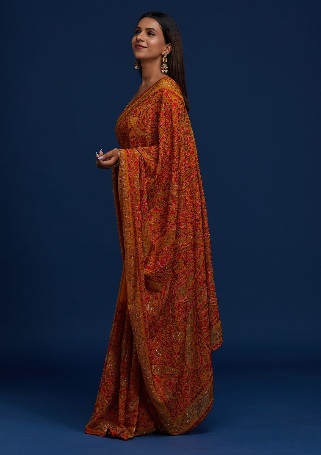Mustard Swarovski Georgette Designer Saree - Koskii