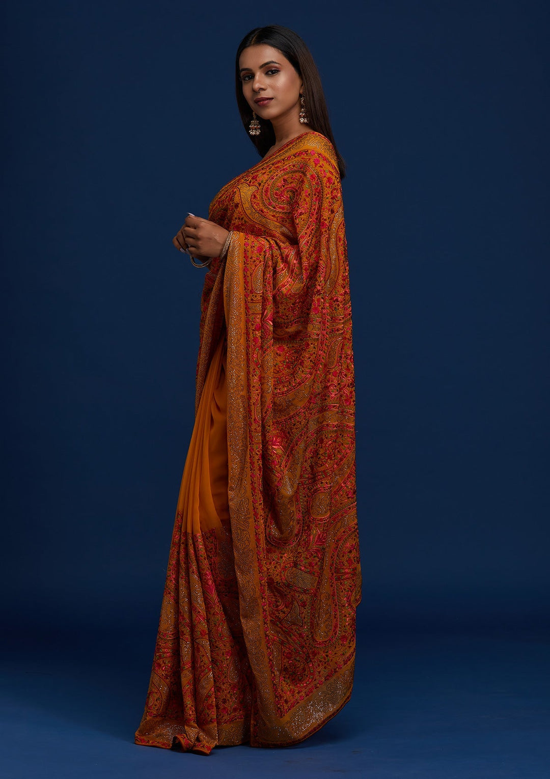 Mustard Swarovski Georgette Designer Saree - Koskii