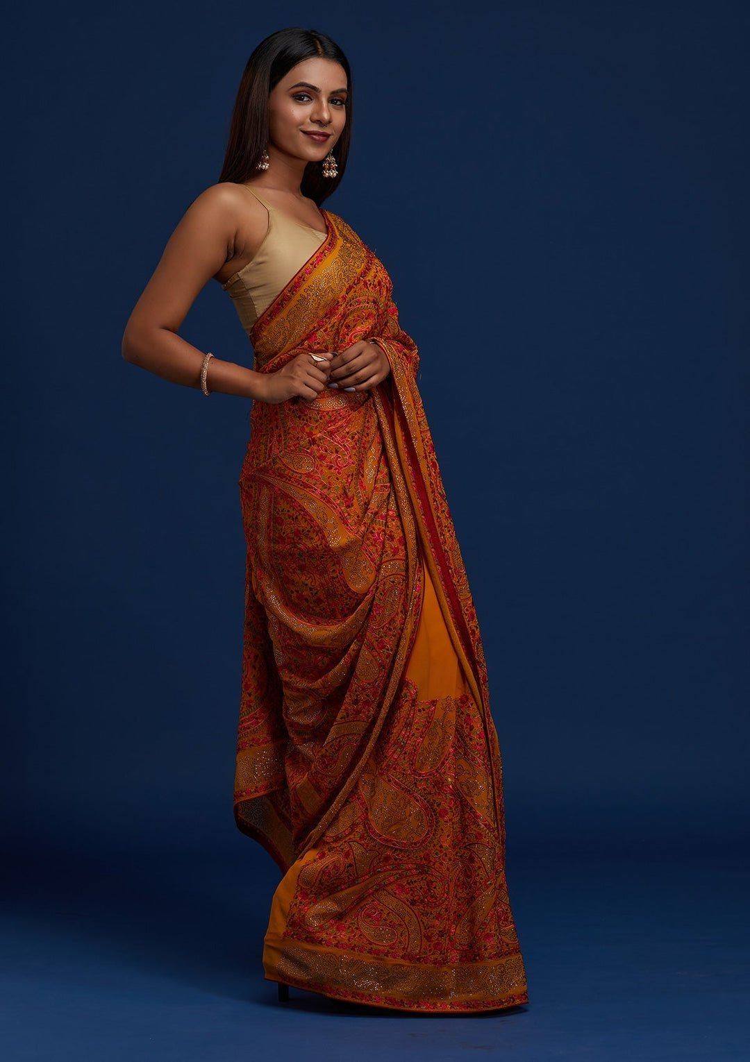 Mustard Swarovski Georgette Designer Saree - Koskii