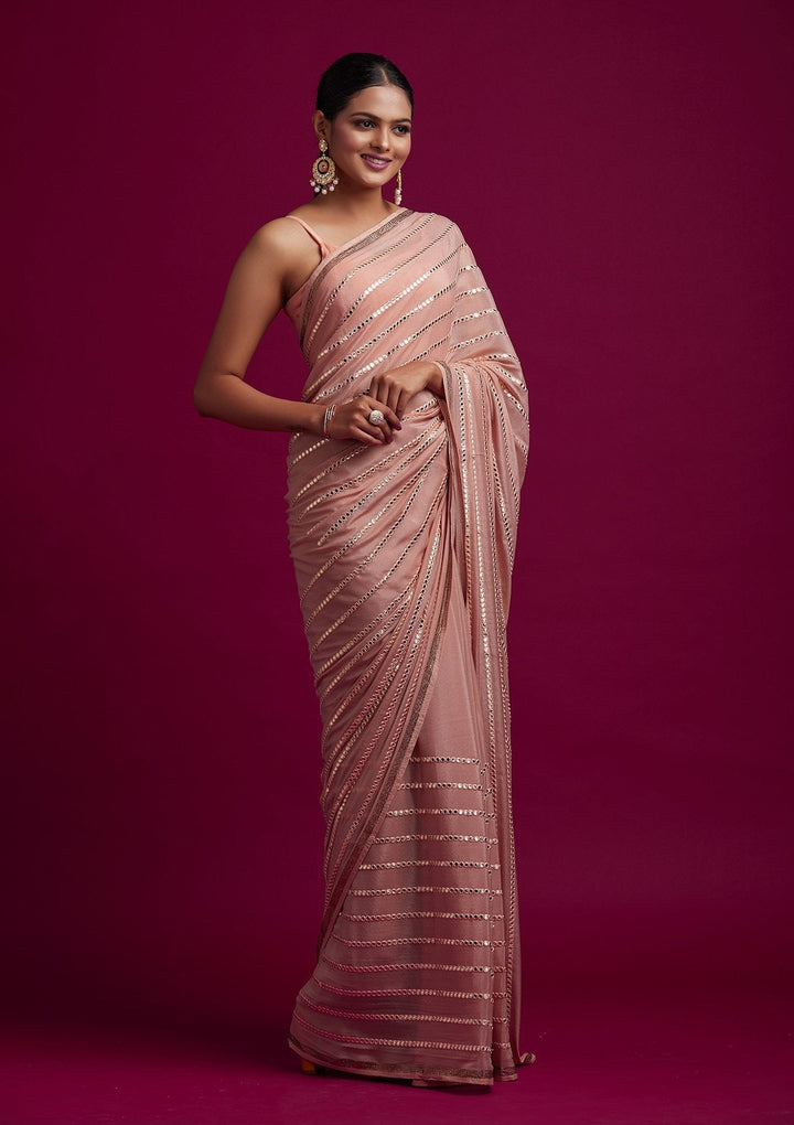 Peach Swarovski Georgette Designer Saree - koskii
