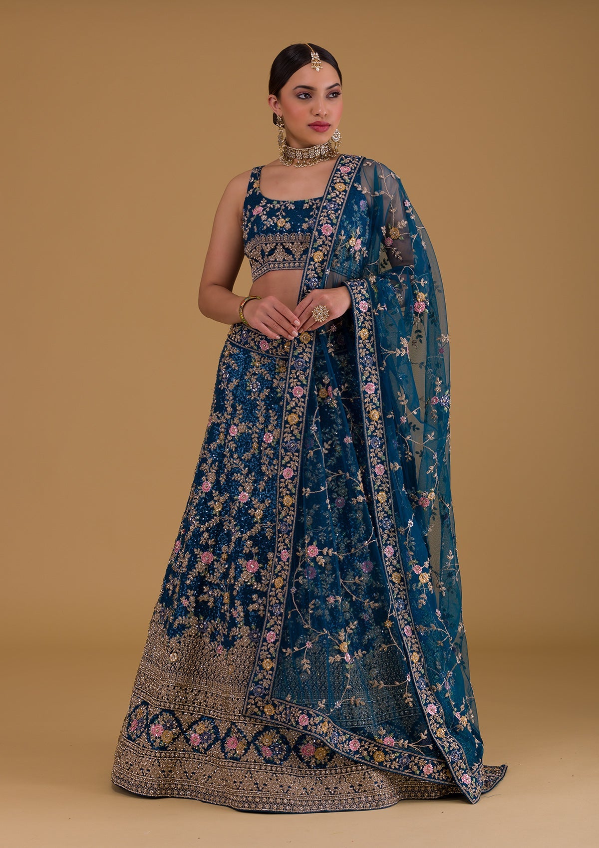 Peacock Blue Stonework Net Designer Lehenga-Koskii