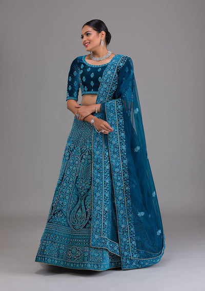 Peacock Blue Stonework Velvet Semi Stitched Lehenga-Koskii