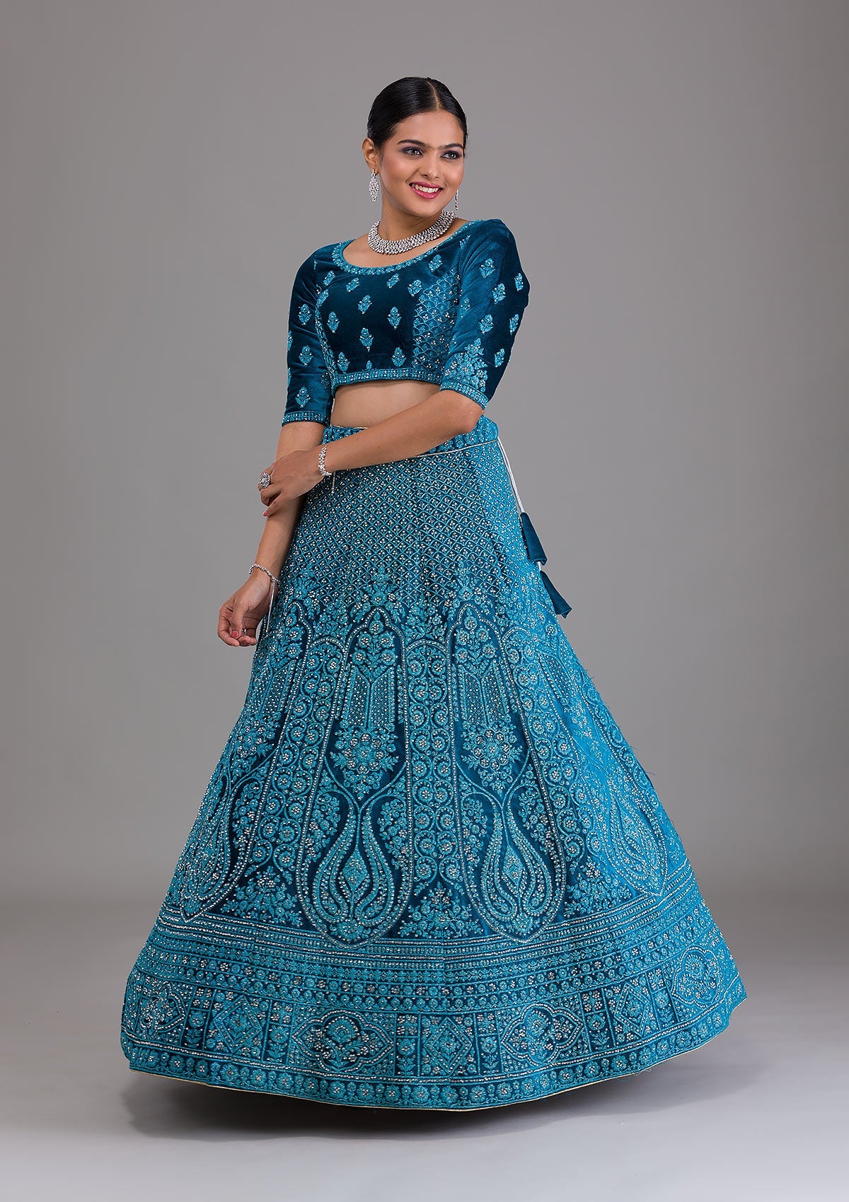 Peacock Blue Stonework Velvet Semi Stitched Lehenga-Koskii