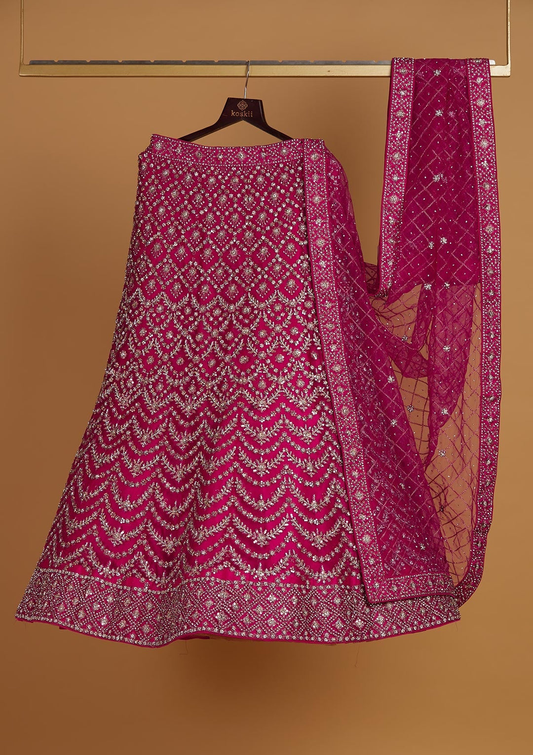 Rani Pink Silver Stonework Net Designer Semi-Stitched Lehenga - Koskii