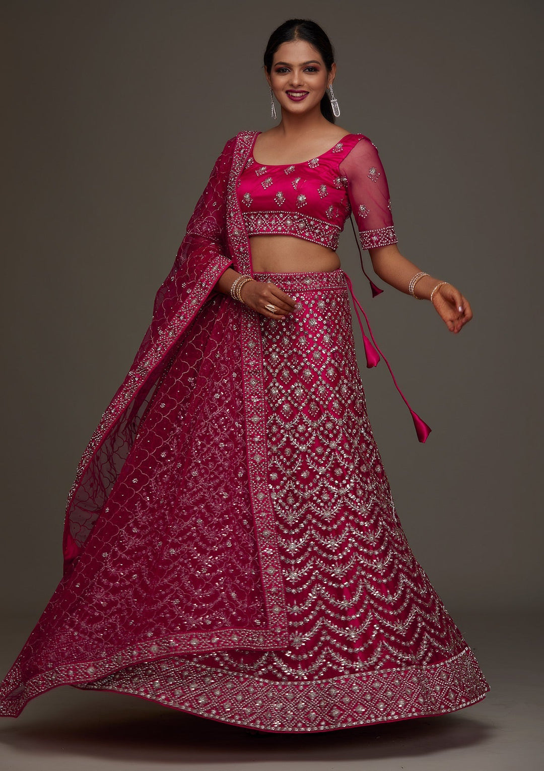 Rani Pink Silver Stonework Net Designer Semi-Stitched Lehenga- Koskii