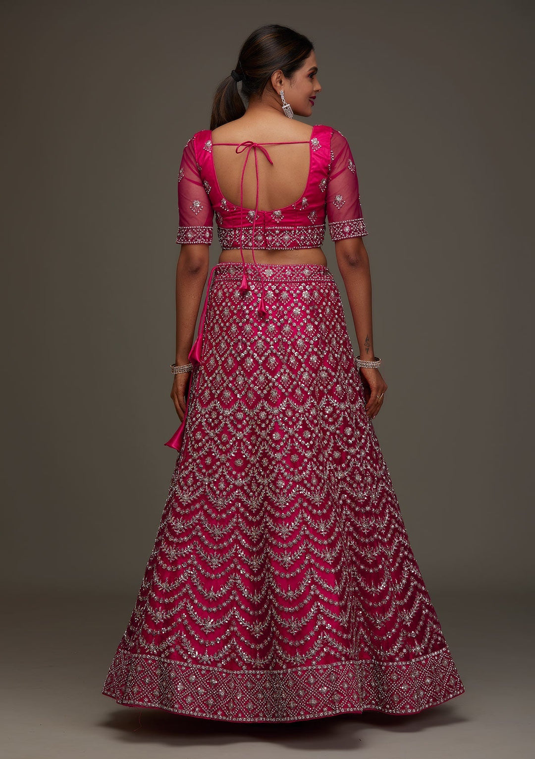 Rani Pink Silver Stonework Net Designer Semi-Stitched Lehenga - Koskii