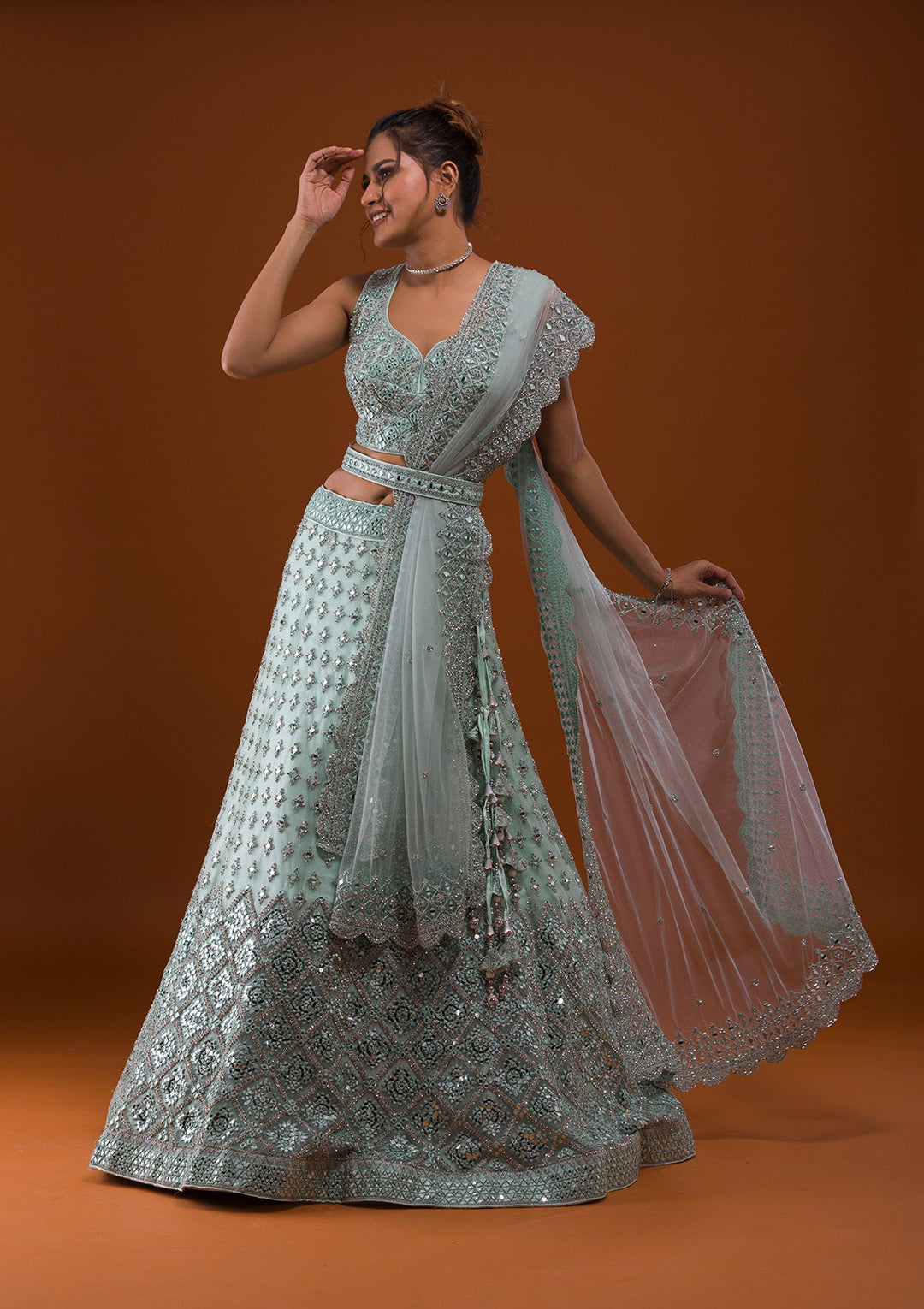 Sea Green Mirrorwork Net Designer Lehenga-Koskii
