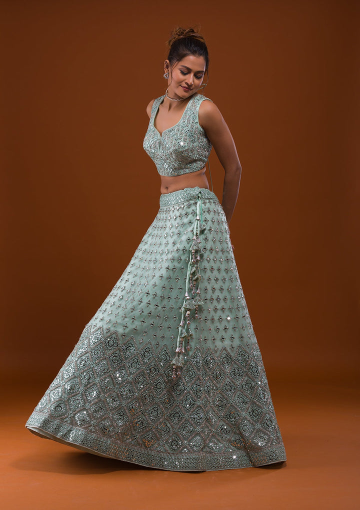 Sea Green Mirrorwork Net Designer Lehenga-Koskii