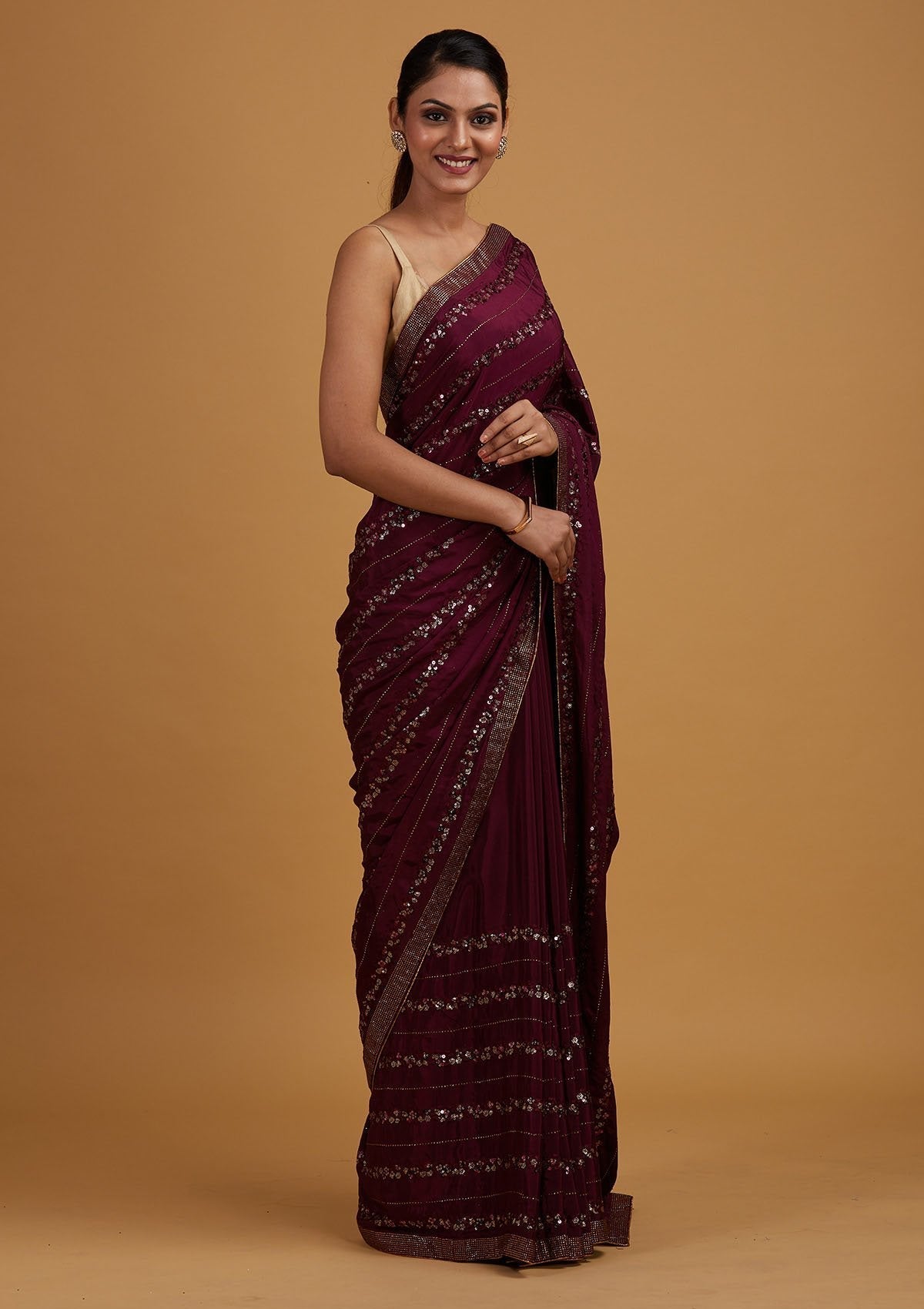 Wine Swarovski Semi Crepe Designer Saree - Koskii